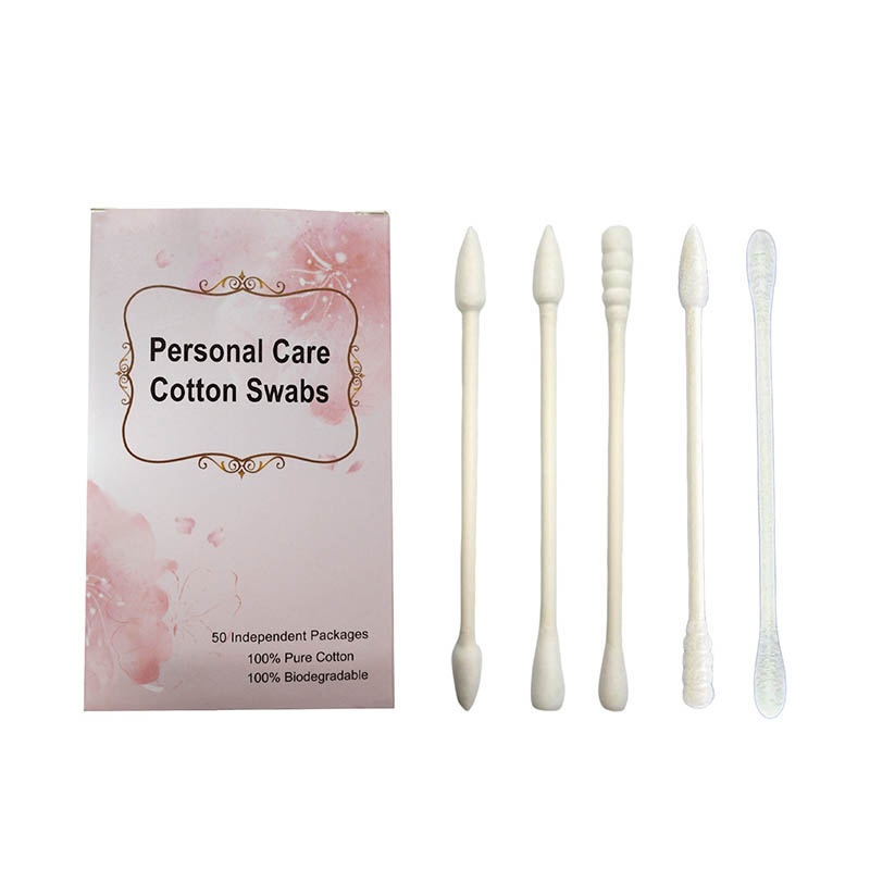 How do paper stick cotton swabs achieve efficient cleaning without leaving residue?